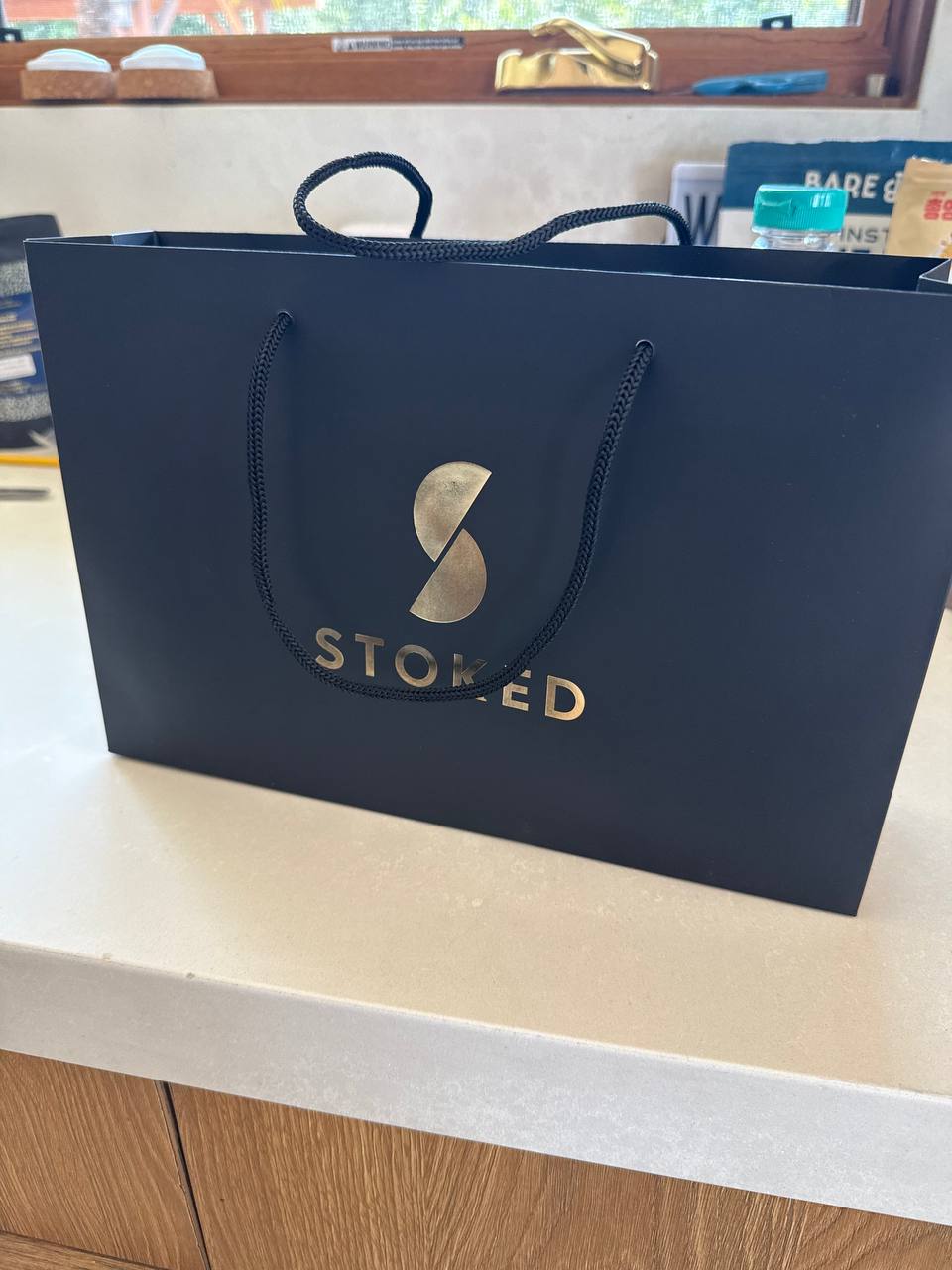 Stoked branded luxury gift bag with gold foil stamping